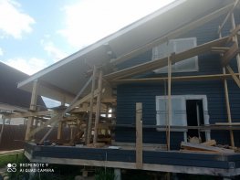 Внешняя отделка дома из бруса по проекту D-32, Истра, КП "Гольфстрим" - сентябрь 2021 г